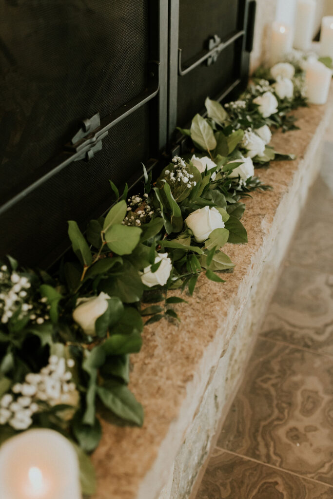 Ancaster Mill Wedding, fireplace mantle garland at Chapel